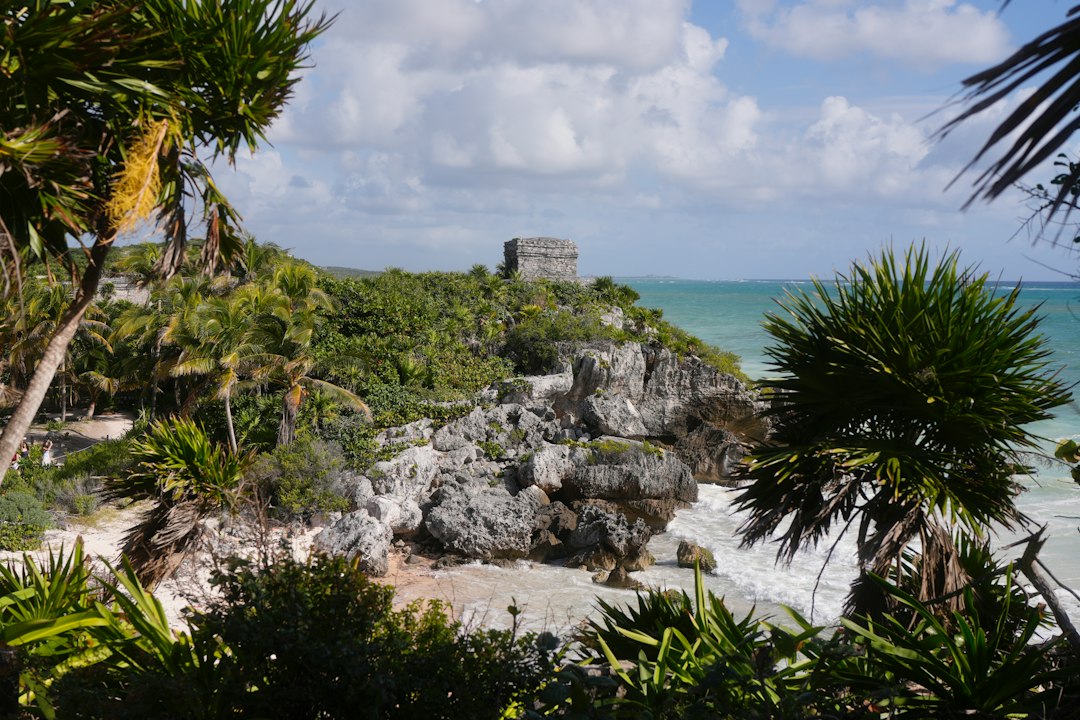 Ancient Mayan ruins on a cliff overlooking the Caribbean Sea